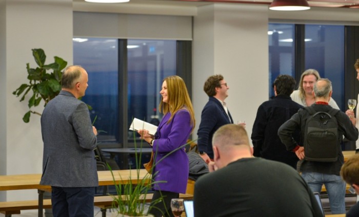 Lecture Series participants networking at the event.